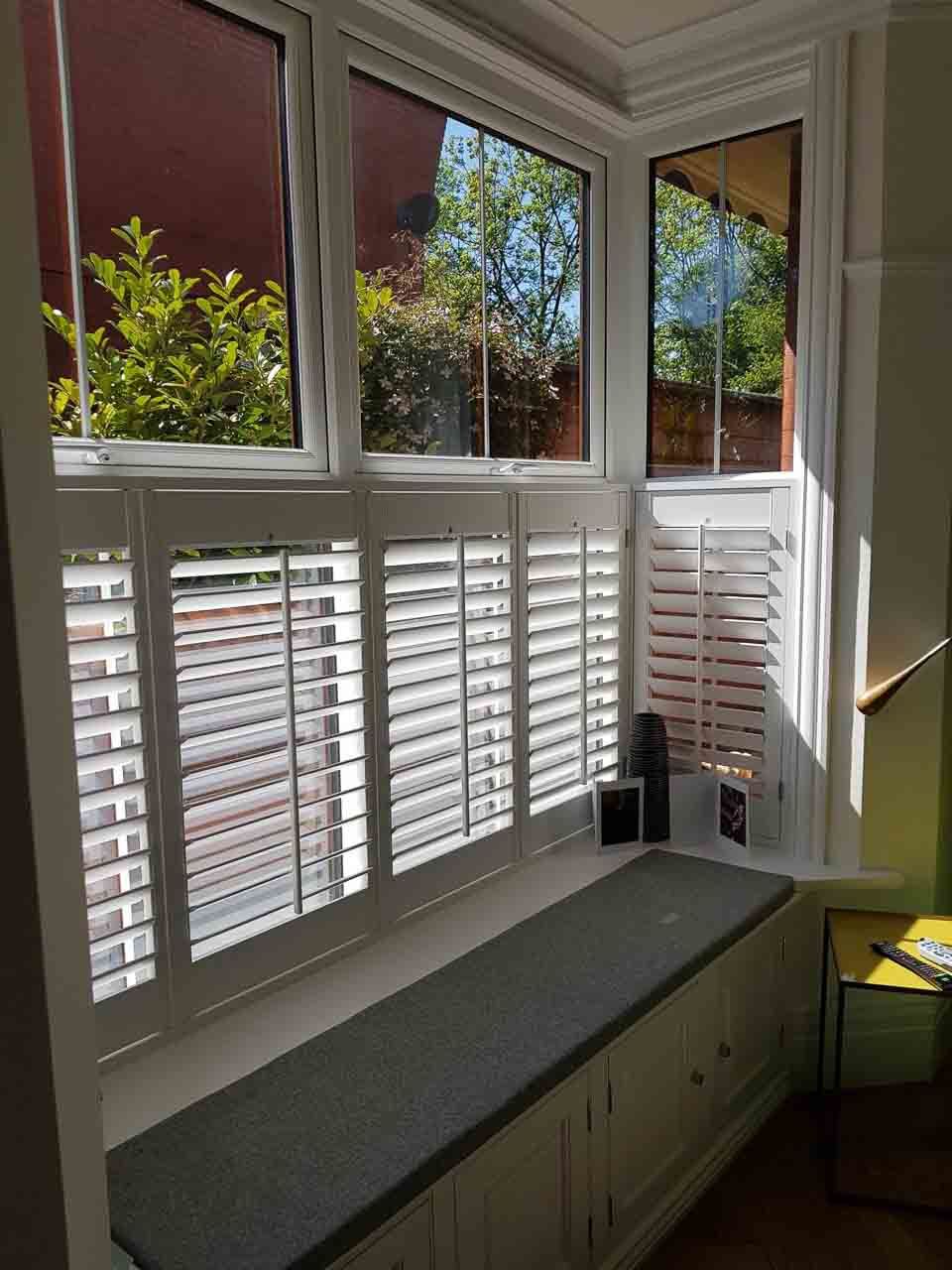 Café style box bay window shutters in Darwen, Lancashire Absolute